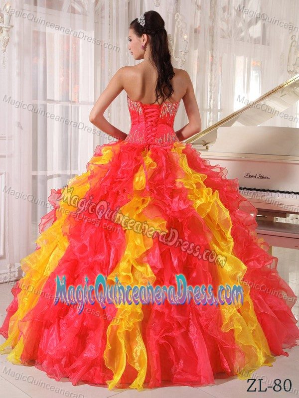 Coral Red and Orange Sequined Sweetheart Dress for Quinces with Ruffles