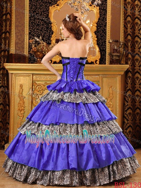 Exclusive Animal Print Multi-color Quinceanera Gown with Ruffled Layers