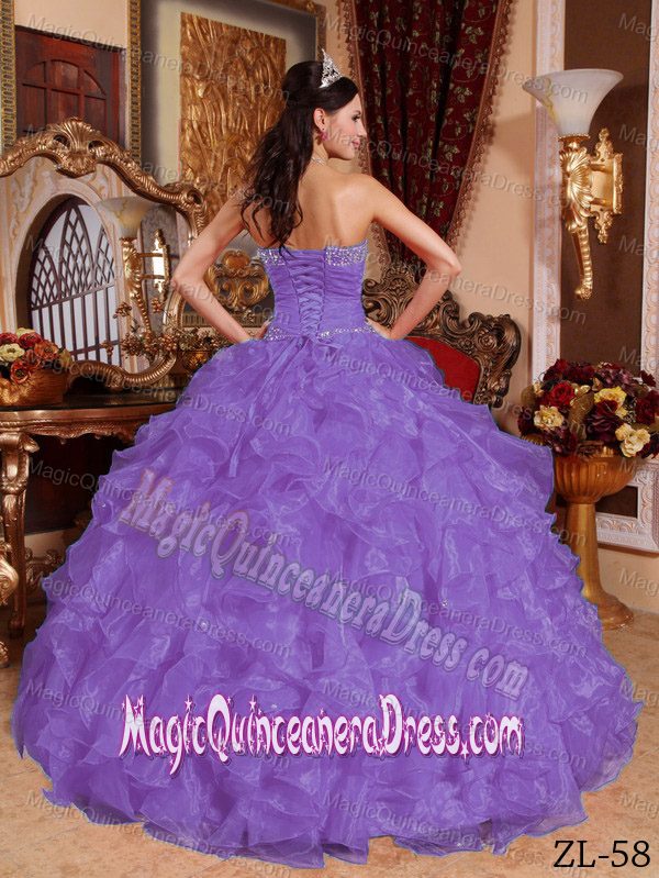 Purple Beaded and Ruched Quinceanera Dress with ruffles in Summersville