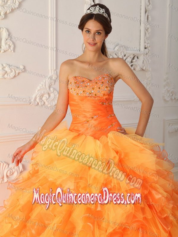 Beaded and Ruffled Orange Red Sweetheart Quinceanera Dress in Sugar Land