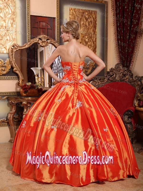 Hot Orange Red Strapless Quinceanera Gown with Appliques and Ruching