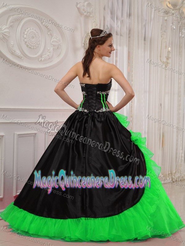 Black and Green Diamonds and Ruffles Quinceanera Gown in Longview