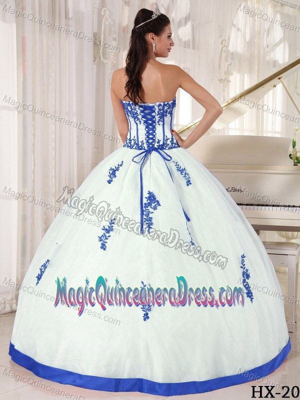 Strapless White Full-length Sweet Sixteen Dress with Blue Appliques in Utica