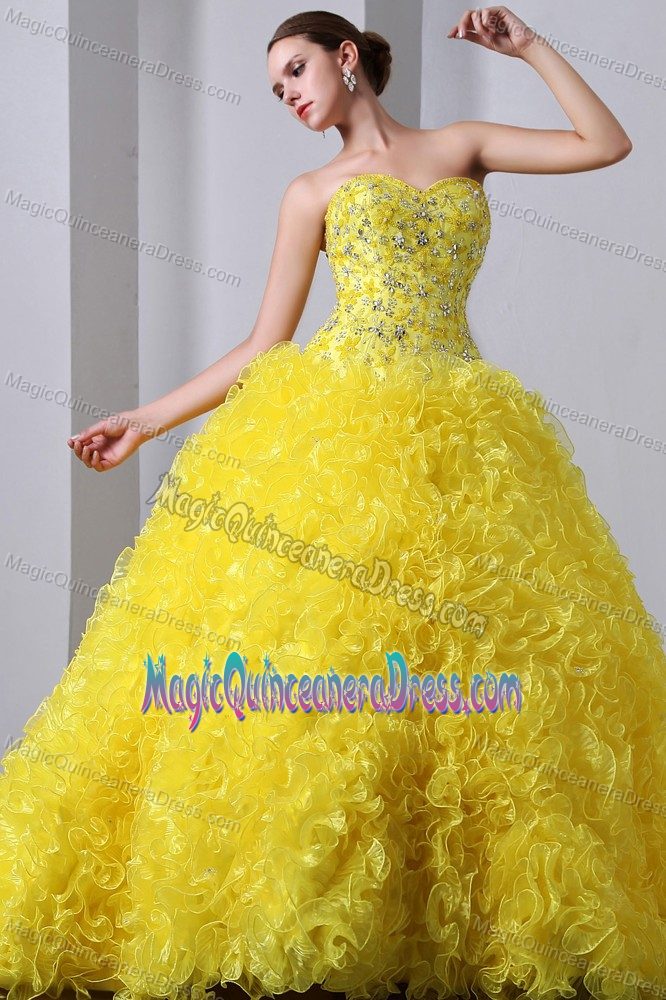 A-Line Sweetheart Yellow Quinceanera Gowns with Brush Train and Ruffles