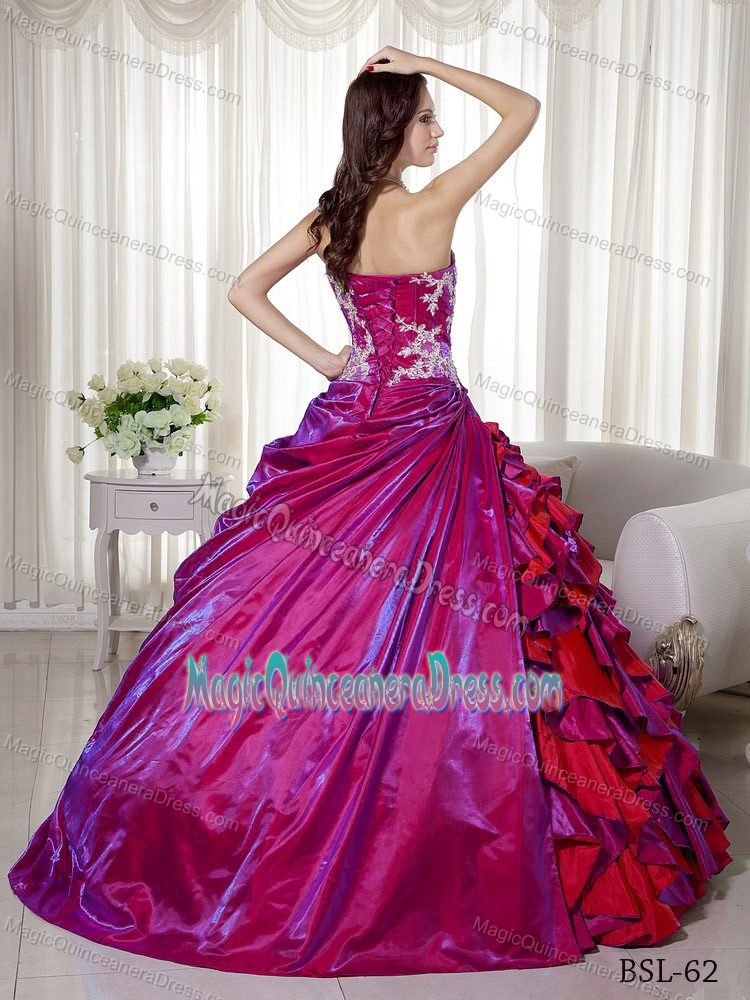Strapless Floor-length Quince Dress in Fuchsia with Appliques and Ruffles
