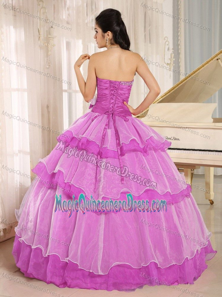 Lavender Beaded Sweetheart Quince Dresses with Ruffle-layers and Flower