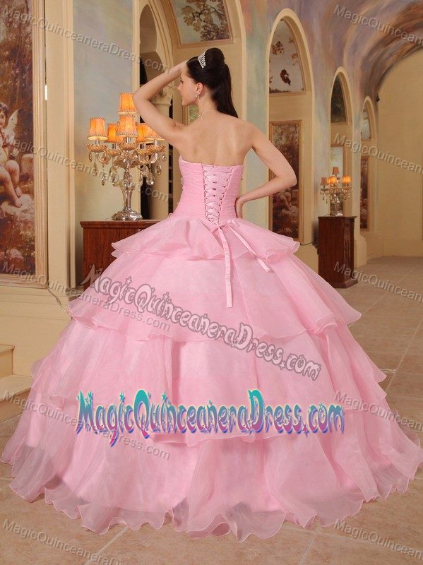 Baby Pink Ruffled Layers and Handle Flowers Quinceanera Gown in Athens