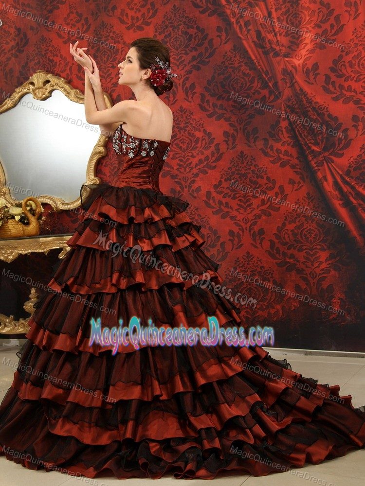 Rust Red and Black Sweetheart Quince Dress with Court Train and Ruffles