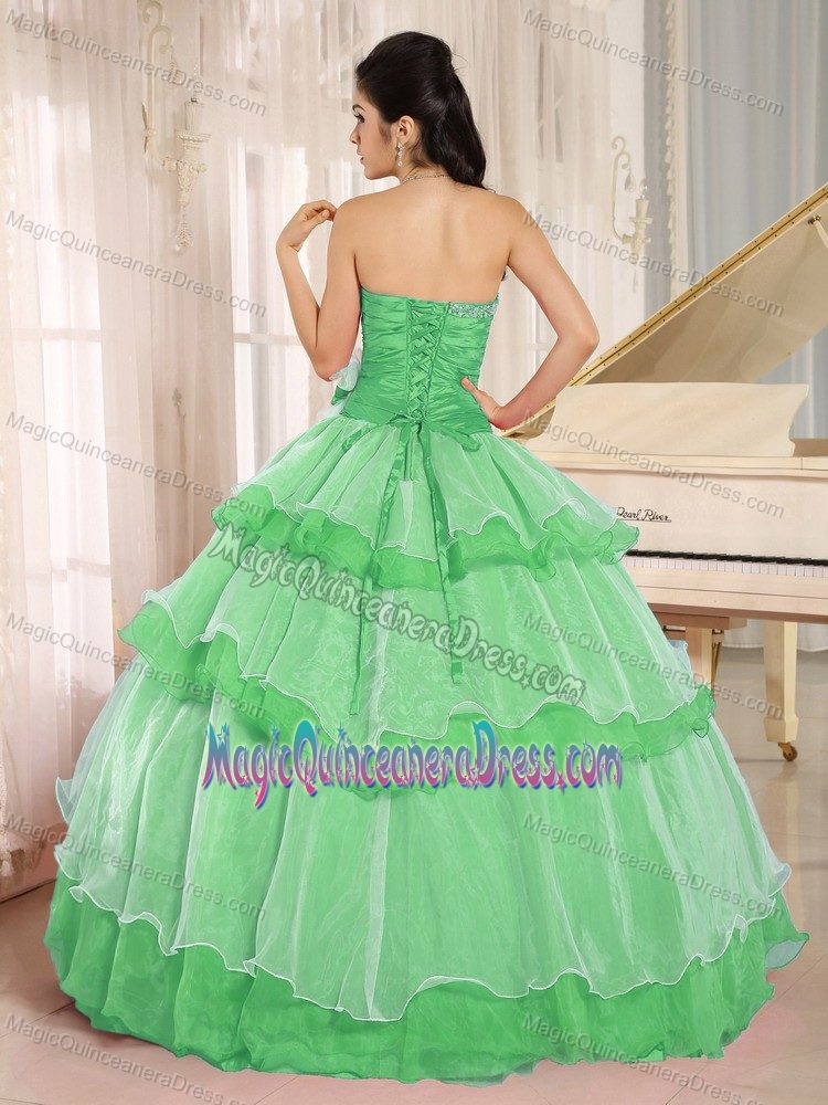 Green Beaded Sweetheart Long Quinceanera Dress with Flower and Layers
