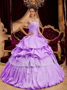 Lavender Beaded Strapless Long Quinceanera Gown with Pick-up and Flower