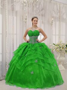 Spring Green Strapless Quince Dresses in Floor-length with Beading and Ruffles