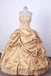 Gold Strapless Appliques and Pick-ups Quinceanera Dress in Santos Brazil