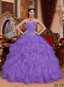 Purple Beaded and Ruched Quinceanera Dress with ruffles in Summersville