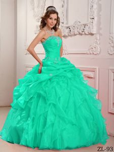 Strapless Apple Green Floor-length Quinces Dress with Ruffles and Pick-ups