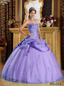 Lace-up Lavender Beaded Long Quinces Dress with Flowers and Appliques