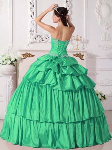 Ruched Green Sweetheart Floor-length Quinceanera Gowns with Beading