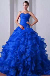Elegant Sweetheart Blue Full-length Quince Dress with Beading and Ruffles