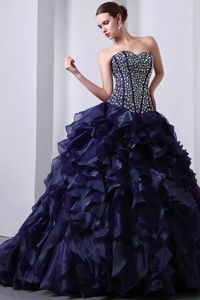 Sweetheart Navy Blue Floor-length Quinces Dress with Ruffles and Beading