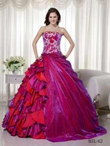 Strapless Floor-length Quince Dress in Fuchsia with Appliques and Ruffles
