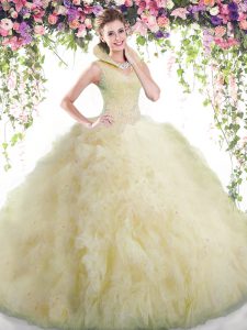 Light Yellow Ball Gowns Tulle High-neck Sleeveless Beading and Ruffles Floor Length Backless Quinceanera Gown