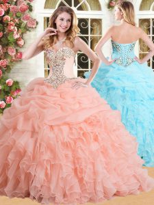 Flare Sleeveless Organza Floor Length Lace Up Quinceanera Gown in Peach with Appliques and Ruffles and Pick Ups